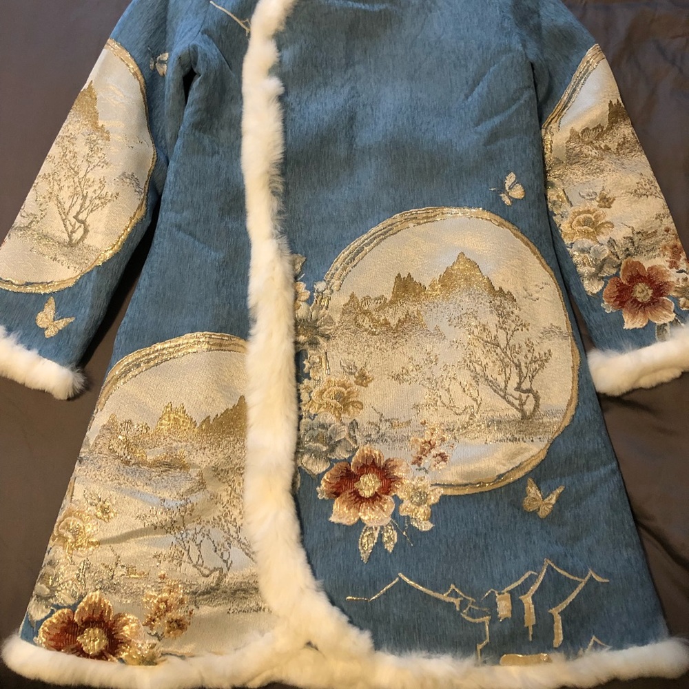 Liziqi women’s rabbit fur coat.